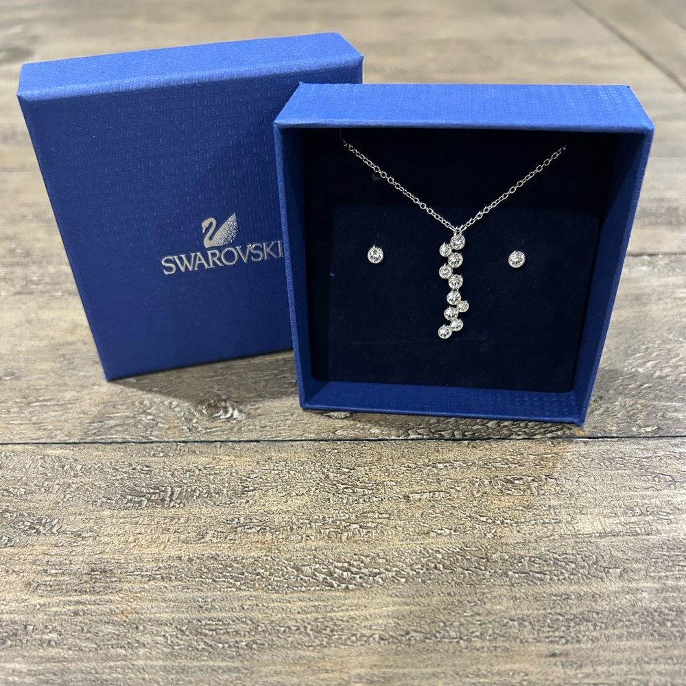 Swarovski Fidelity Set, including a pendant necklace and stud earrings